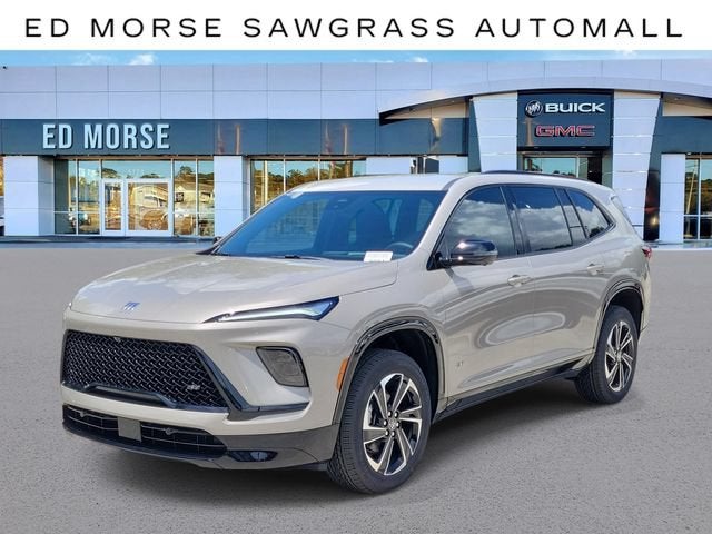 2026 Buick Enclave Sport Touring in Stone Metallic — front three-quarter view